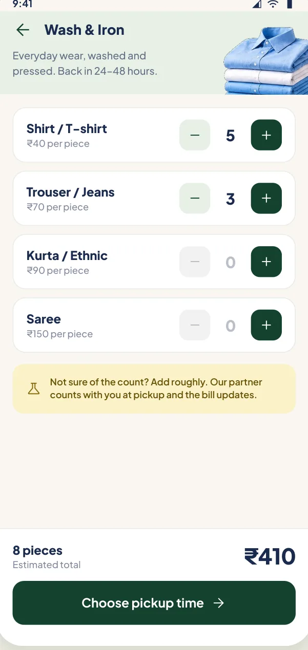 Item picker with shirts and trousers added and an estimated total of ₹410