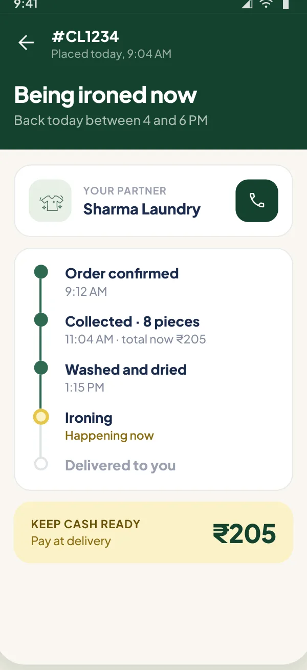 Order tracker showing confirmed, collected, washed and ironing stages
